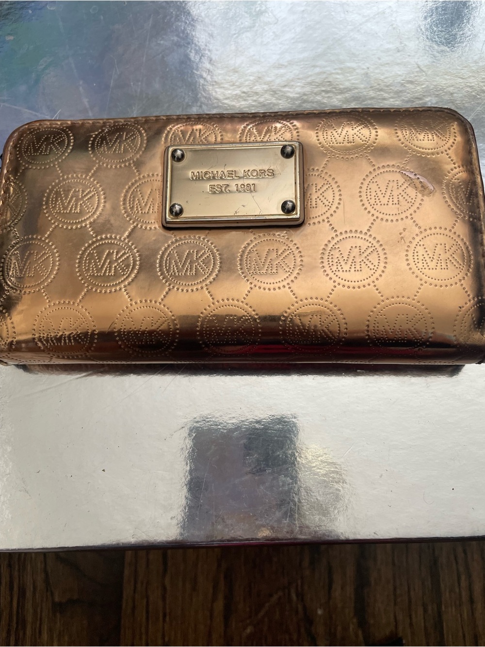 Michael Kors Metallic Copper Zip Wallet with Embossed MK Pattern